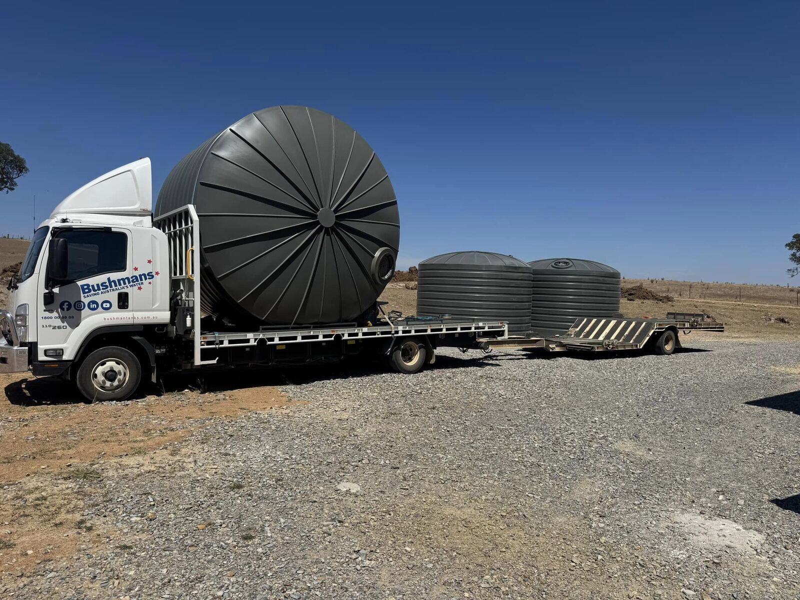 Bushmans rural water tanks loaded on a truck for delivery to a property in the Canberra region